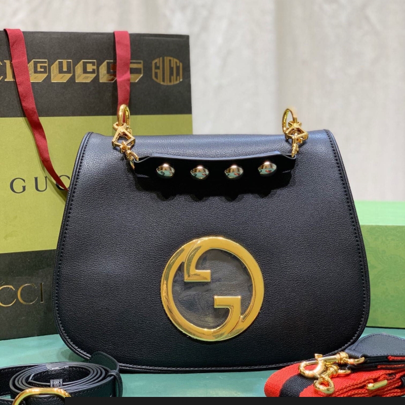 G*u*i top handle bags